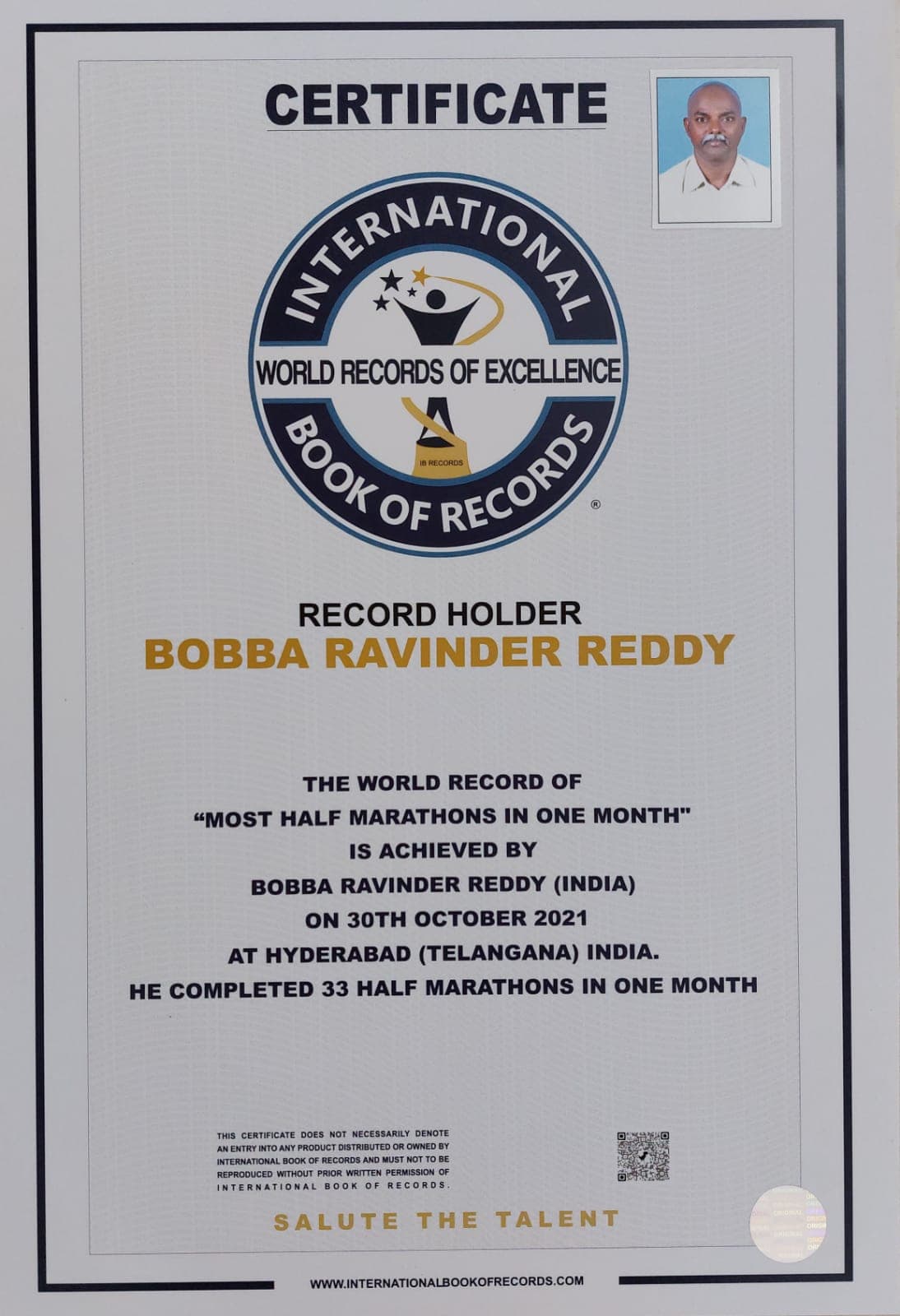 International Book of Records certificate for Most Half Marathons in One Month, awarded to Bobba Ravinder Reddy